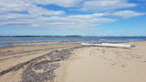 Picture relating to Sandy Point - titled 'Looking east across the bay'