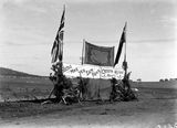 Picture relating to Canberra - titled 'Royal visit - Greetings erected by the Canberra Highland Society (Long may your chimney smoke)'