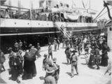 Picture relating to Brisbane - titled 'Soldiers farewell friends and family before boarding ship at the Pinkenba Wharf, Brisbane, ca.1915'