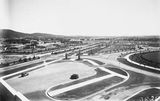 Picture relating to Canberra - titled 'Commonwealth Avenue, Hotel Canberra and Albert Hall from West Block.'