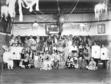 Picture relating to Deakin - titled 'Group of competitors at Fancy Dress Ball at St Gabriel's Church of England Girls Grammar School. Melbourne Avenue, Deakin.'