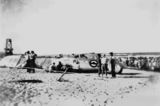 Picture relating to Maroochydore - titled 'Plane crash on the beach at Maroochydore, ca. 1950'