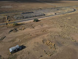 Gilliat - nothing left. Station was where mound of dirt is, pub, post office about where car is parked
