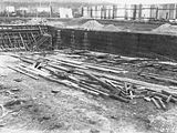 Picture relating to Manuka - titled 'Manuka swimming pool under construction, wall reinforcement being installed, Manuka Circle, Kingston.'