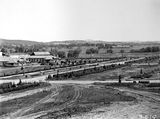 Picture relating to Acton - titled 'Commonwealth Avenue looking north from West Block showing Hotel Canberra and Hotel Acton'