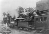 Picture relating to Queensland - titled 'Watering a steam train on the Western Railway Line, Queensland, 1890-1900'