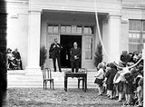 Picture relating to Bruce - titled 'Sir John Butters speaking at the opening the Ainslie School in September 1927, with the Rt Hon Stanley Melbourne Bruce.'