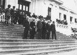 Picture relating to Scullin - titled 'Anzac Day 1933, Prime Minister Hon J. A. Lyons, Leader of the Opposition, Hon J. A. Scullin and members on front steps of Old Parliament House.'
