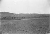 Picture relating to Forrest - titled 'Cottages in Forrest from Kingston - Manuka Oval in front'